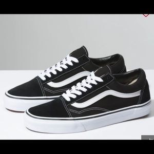 Woman’s black Vans